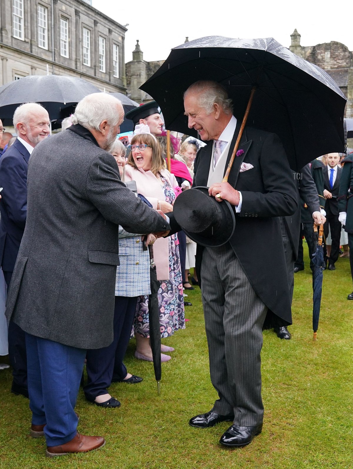 King Charles III attends a garden party at the Palace of Holyroodhouse in Edinburgh on July 4, 2023 (Jonathan Brady - WPA Pool/Getty Images)