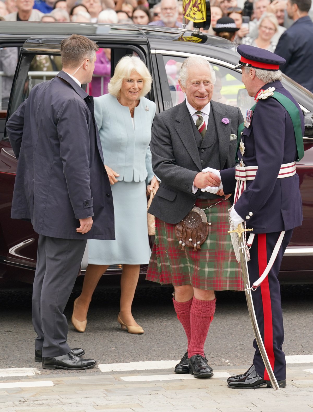 King Charles III and Queen Camilla visit the marketplace in Selkirk, south of Edinburgh, on July 6, 2023 (ANDREW MILLIGAN/POOL/AFP via Getty Images)