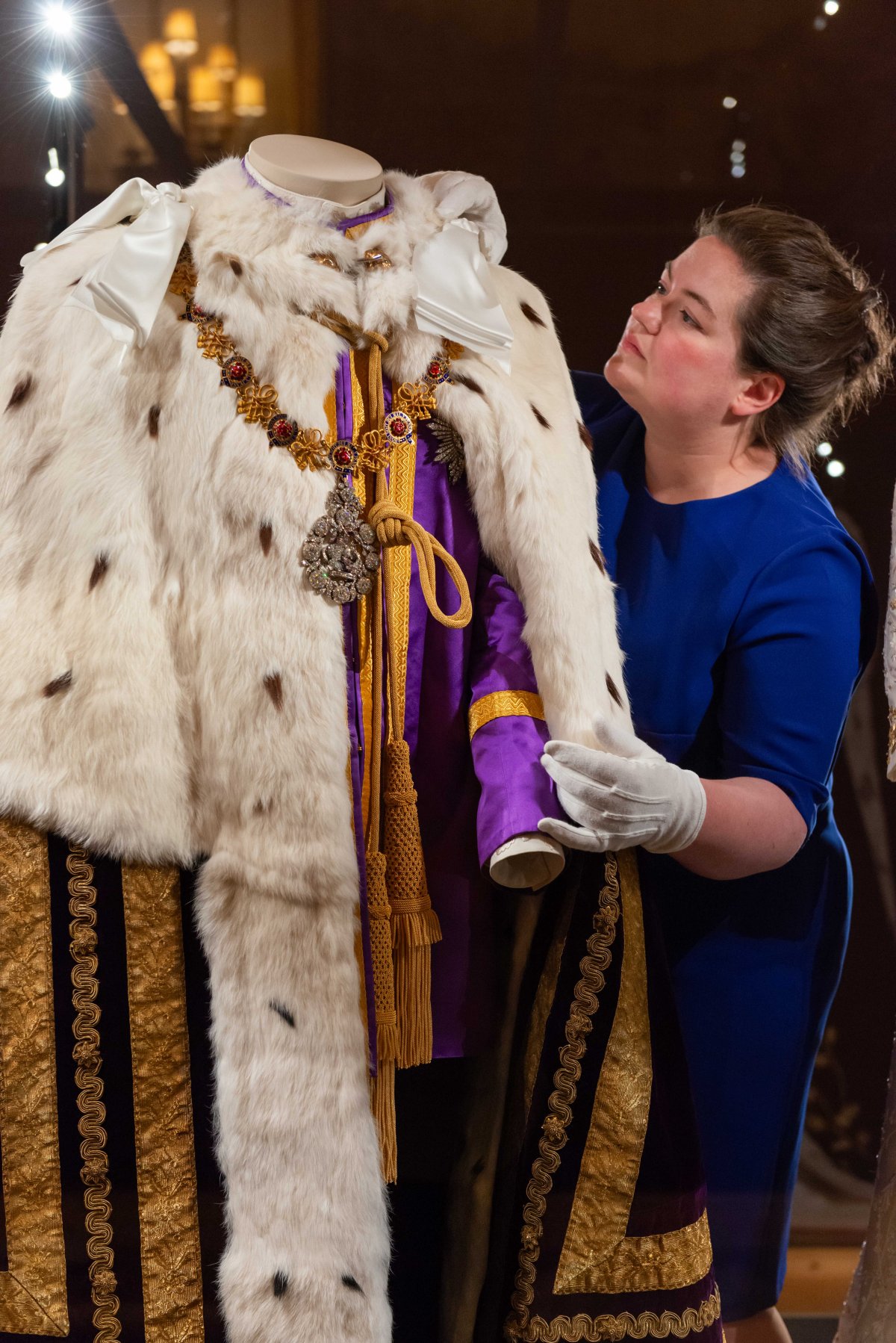 The coronation outfits worn by King Charles III and Queen Camilla are displayed to the public for the first time at Buckingham Palace, July 2023 (Royal Collection Trust)