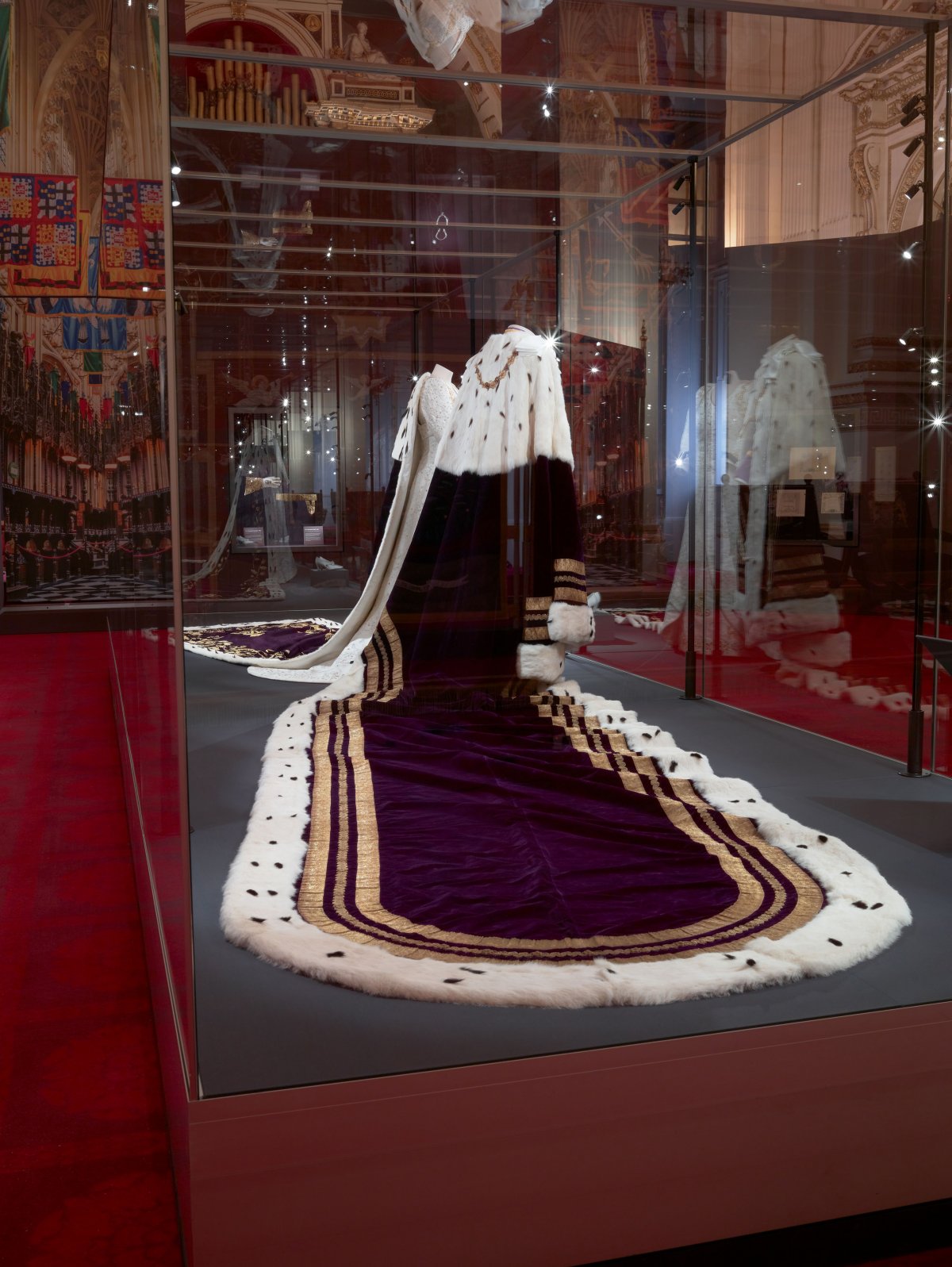 The coronation outfits worn by King Charles III and Queen Camilla are displayed to the public for the first time at Buckingham Palace, July 2023 (Royal Collection Trust)