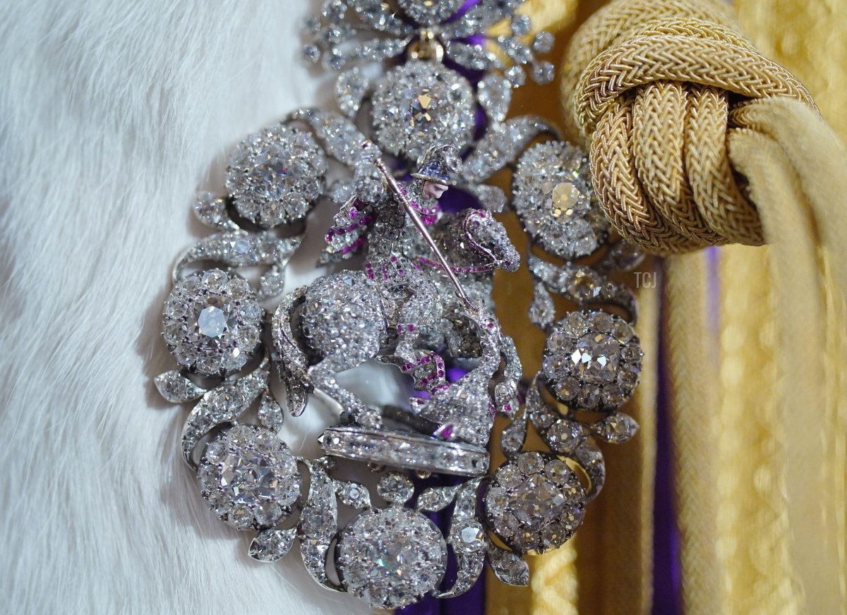 The coronation outfits worn by King Charles III and Queen Camilla are displayed to the public for the first time at Buckingham Palace, July 2023 (Yui Mok/PA Images/Alamy)