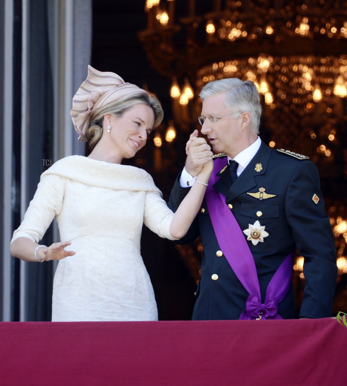King Philippe and Queen Mathilde of the Belgians are pictured on the day of his inauguration in Brussels, July 21, 2013 (THIERRY CHARLIER/AFP via Getty Images)