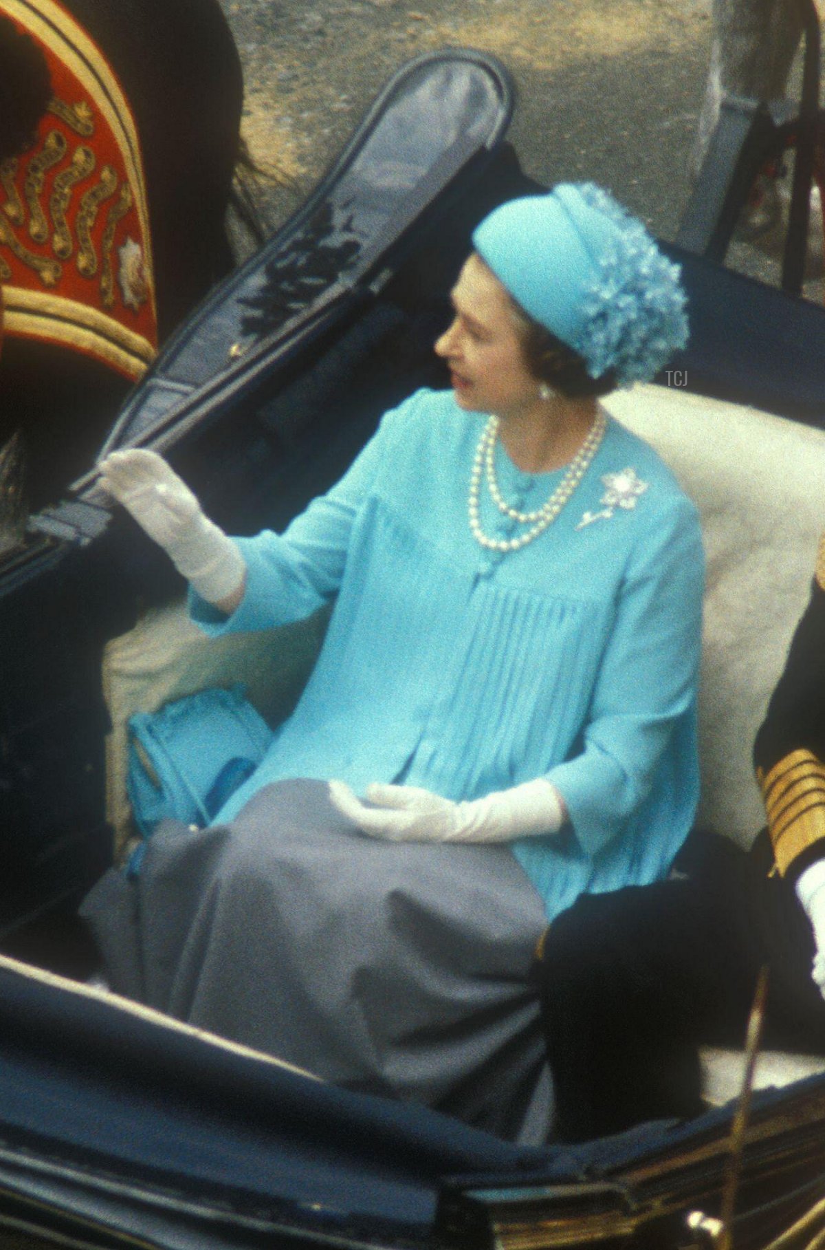 Queen Elizabeth II leaves Buckingham Palace in a carriage to travel to St. Paul's Cathedral for the wedding of the Prince of Wales and Lady Diana Spencer, July 29, 1981 (Goddard Archive Portraits/Alamy)