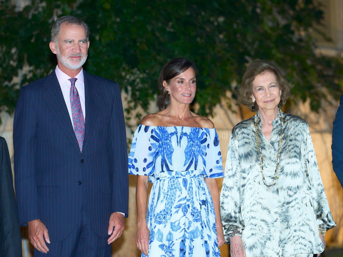 King Felipe VI, Queen Letizia, and Queen Sofia of Spain attend a dinner for local authorities at Marivent Palace in Palma de Mallorca on August 3, 2023 (MPG/Alamy)
