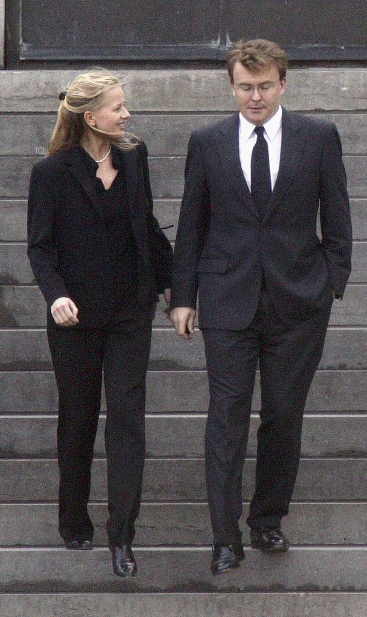 Mabel Wisse Smit and Prince Friso leave Soestdijk Palace on March 21, 2004, on the day after the passing of his grandmother, Queen Juliana of the Netherlands (Michel Porro/Getty Images)