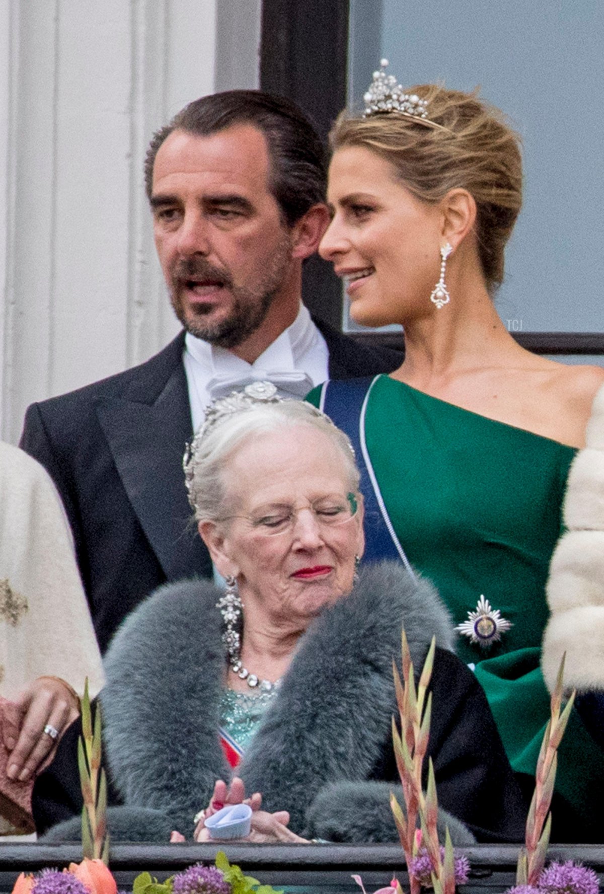 Prince Nikolaos and Princess Tatiana stand behind Queen Margrethe II of Denmark on the balcony of the Royal Palace in Oslo on May 9, 2017 (Patrick van Katwijk/DPA Picture Alliance/Alamy)