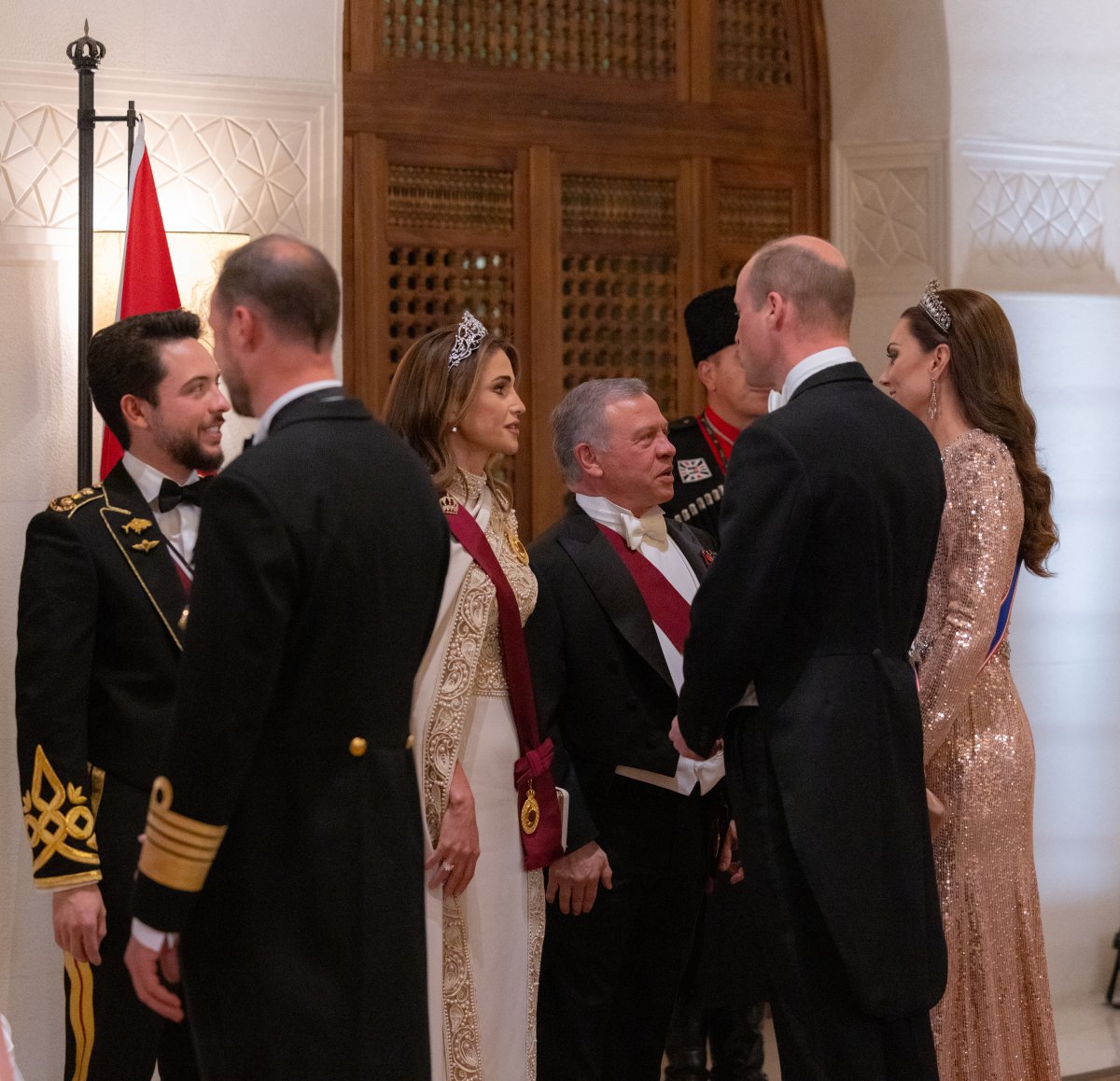 King Abdullah II and Queen Rania of Jordan greet the Prince and Princess of Wales, while Crown Prince Hussein and Princess Rajwa (not pictured) speak with Crown Prince Haakon of Norway, during a banquet celebrating the wedding of Crown Prince Hussein and Princess Rajwa of Jordan in Amman on June 1, 2023 (Royal Hashemite Court)