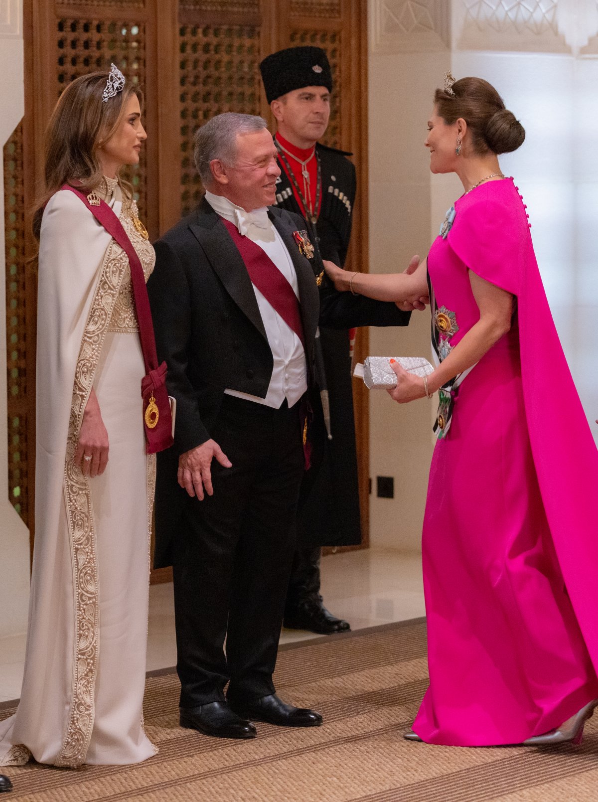 King Abdullah II and Queen Rania of Jordan greet Crown Princess Victoria of Sweden during a banquet celebrating the wedding of Crown Prince Hussein and Princess Rajwa of Jordan in Amman on June 1, 2023 (Royal Hashemite Court)