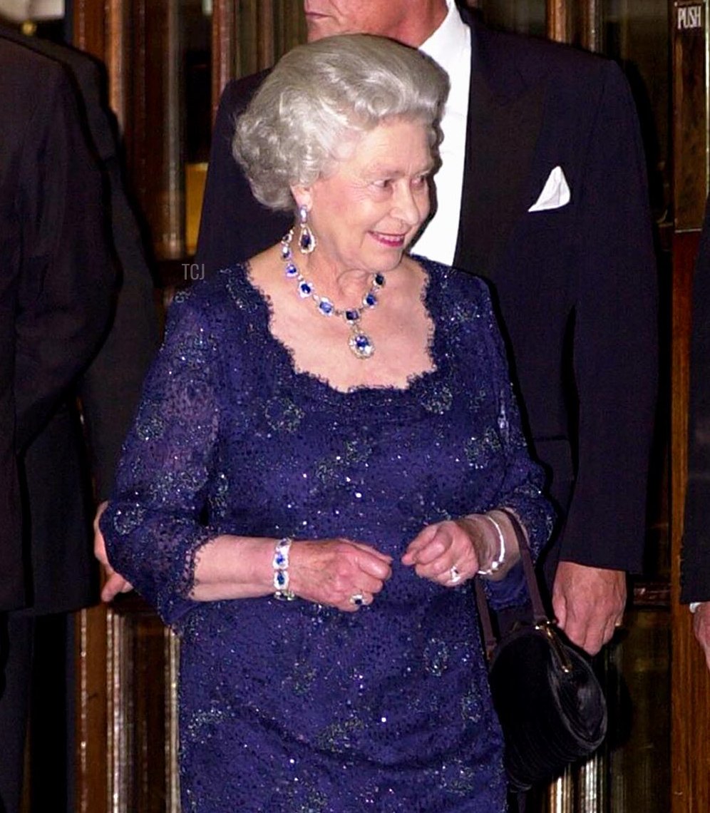 Queen Elizabeth II leaves the Ritz Hotel in London after a party celebrating her Golden Jubilee, November 14, 2002 (LOTTA JANSSON/AFP via Getty Images)