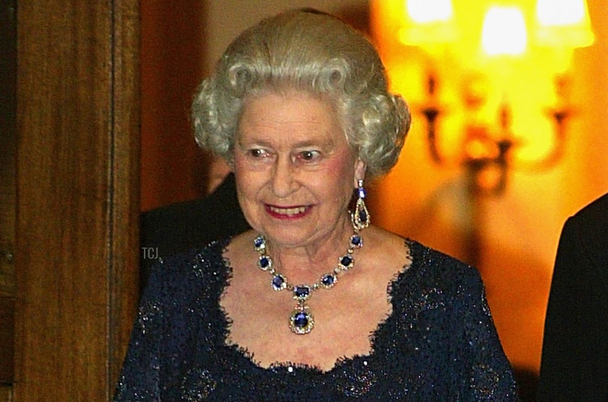 Queen Elizabeth II leaves the Ritz Hotel in London after a party celebrating her Golden Jubilee, November 14, 2002 (Scott Barbour/Getty Images)