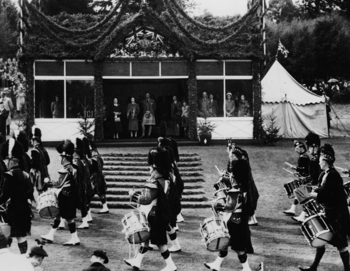The Queen Mother, Queen Elizabeth II, and the Duke of Edinburgh attend the Braemar Gathering in Braemar, Scotland, on September 4, 1953 (Cochrane/Fox Photos/Getty Images)