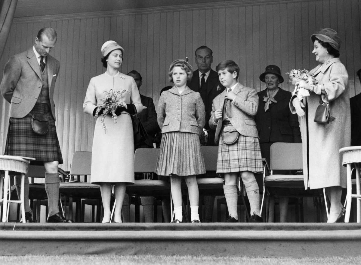 The Duke of Edinburgh, Queen Elizabeth II, Princess Anne, the Duke of Rothesay, and the Queen Mother attend the Braemar Gathering in Braemar, Scotland, on September 9, 1960 (CENTRAL PRESS/AFP via Getty Images)
