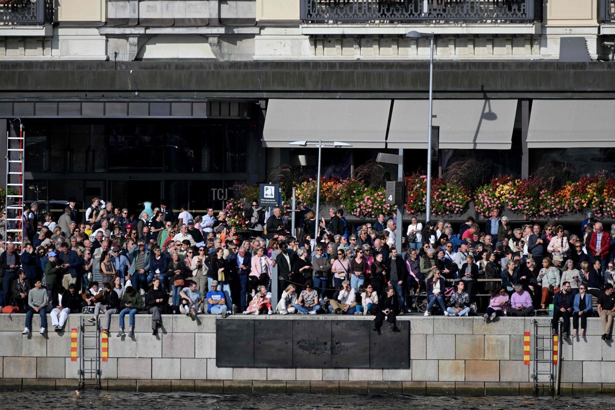 Crowds gather to watch the royal procession during the Golden Jubilee celebrations for King Carl XVI Gustaf of Sweden in Stockholm on September 16, 2023 (JONATHAN NACKSTRAND/AFP via Getty Images)