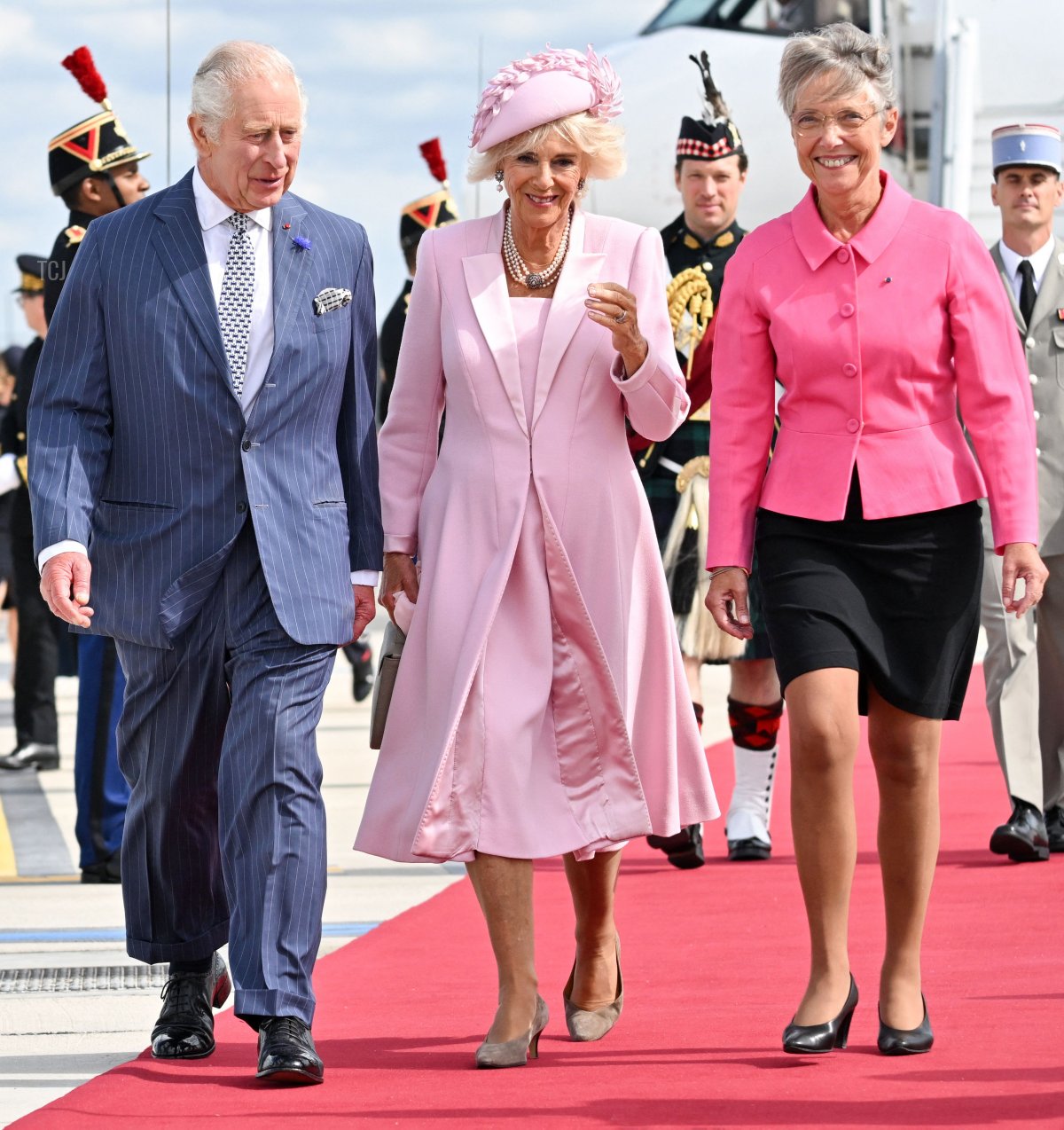 King Charles III and Queen Camilla of the United Kingdom are greeted by French Prime Minister Elisabeth Borne as they arrive in Paris for the start of a state visit to France on September 20, 2023 (Tim Rooke - Pool/Getty Images)