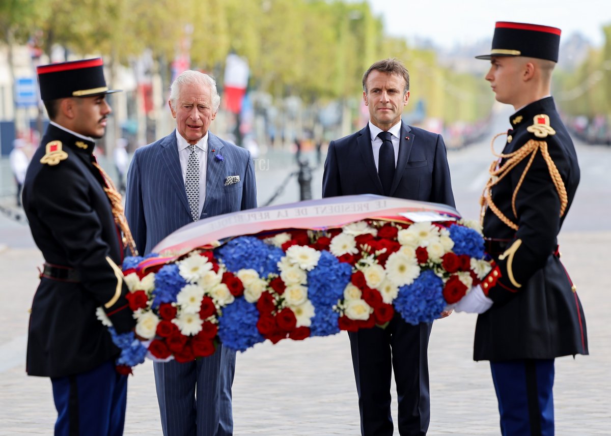 King Charles III of the United Kingdom and President Emmanuel Macron participate in a wreath-laying ceremony at the Arc de Triomphe in Paris during an official welcome ceremony at the start of a state visit to France on September 20, 2023 (Chris Jackson - WPA Pool/Getty Images)