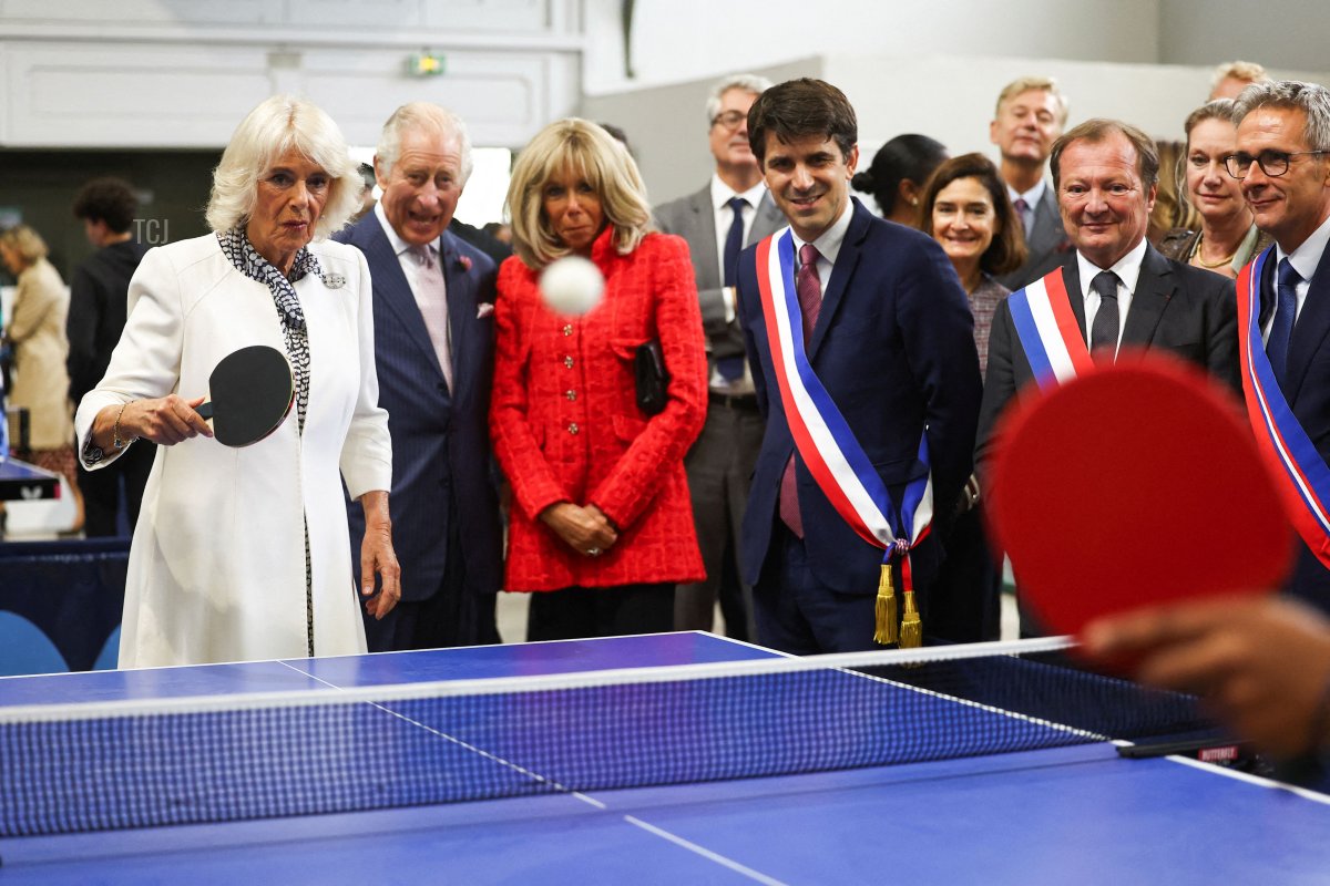 King Charles III and Queen Camilla of the United Kingdom, with Brigitte Macron, visit Saint-Denis in Paris during the British state visit to France, September 21, 2023 (HANNAH MCKAY/POOL/AFP via Getty Images)