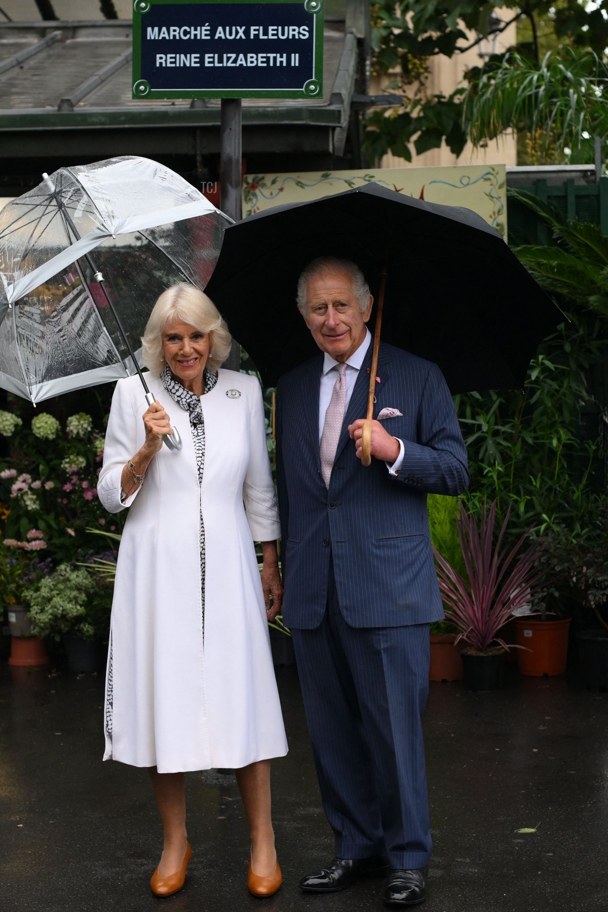 King Charles III and Queen Camilla of the United Kingdom visit the Queen Elizabeth II Flower Market in Paris during their state visit to France, September 21, 2023 (DANIEL LEAL/POOL/AFP via Getty Images)