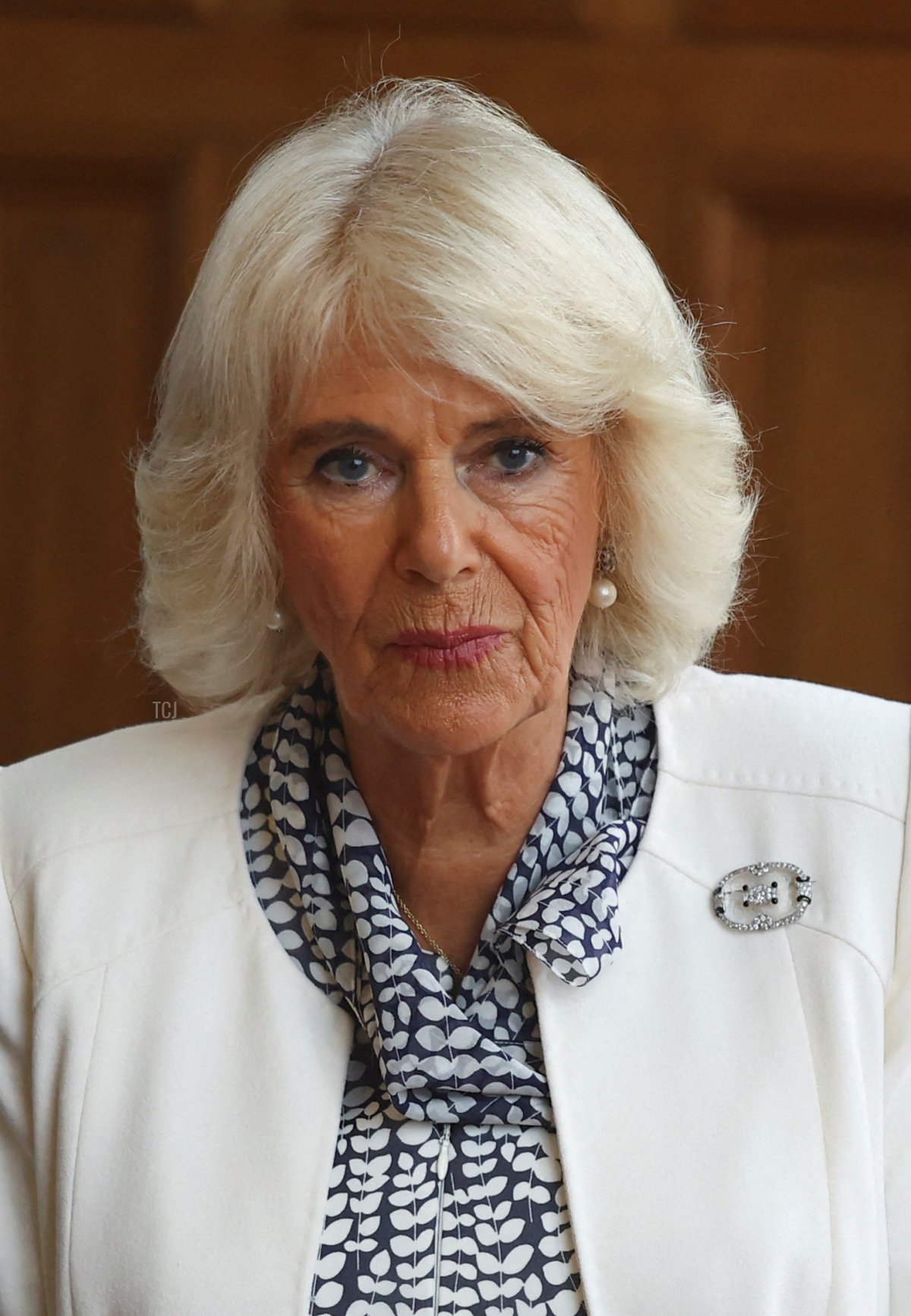 Queen Camilla of the United Kingdom meets with members of La Maison des Femmes, an organization for victims of domestic abuse, in Saint-Denis near Paris during the British state visit to France, September 21, 2023 (Hannah McKay-Pool/Getty Images)