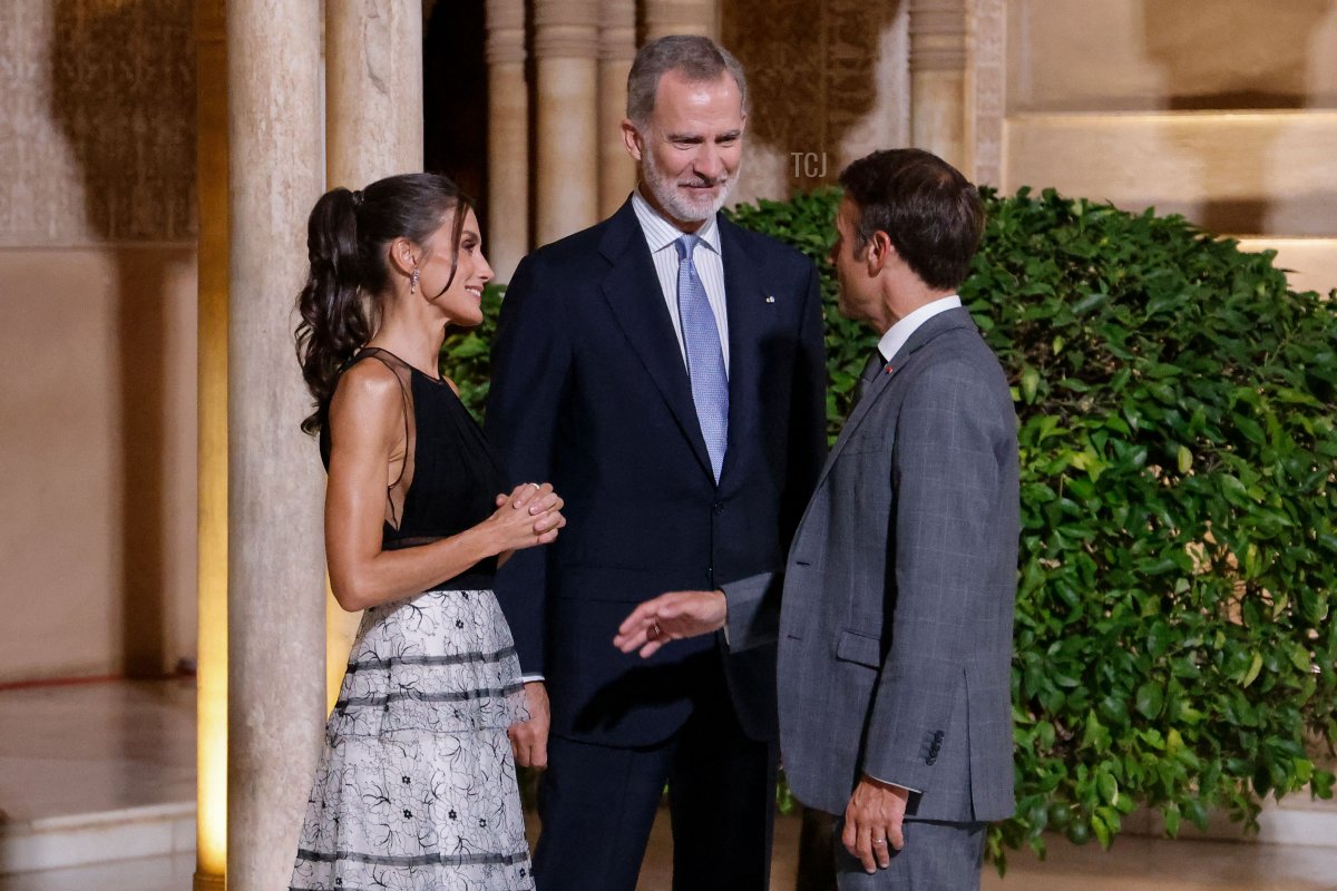 King Felipe VI and Queen Letizia of Spain greet French President Emmanuel Macron at the Alhambra during the European Political Community summit in Granada on October 5, 2023 (LUDOVIC MARIN/AFP via Getty Images)