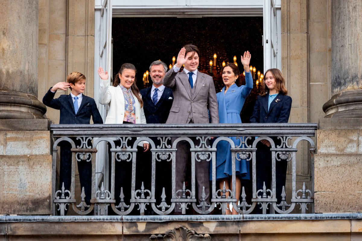Prince Christian of Denmark, with Crown Prince Frederik, Crown Princess Mary, Princess Isabella, Prince Vincent, and Princess Josephine, waves from the balcony of Amalienborg Palace during his 18th birthday celebrations in Copenhagen on October 15, 2023 (Patrick van Katwijk/DPA Picture Alliance/Alamy)