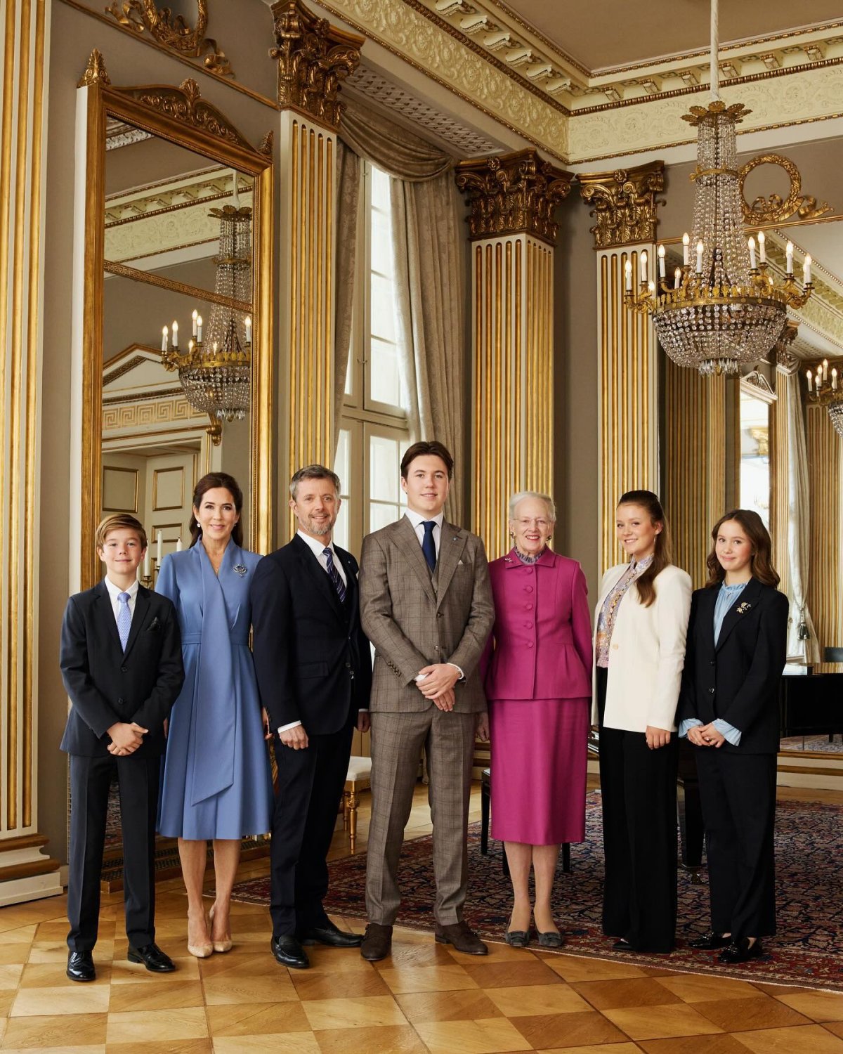 Prince Christian of Denmark poses with Queen Margrethe II, Crown Prince Frederik, Crown Princess Mary, Princess Isabella, Prince Vincent, and Princess Josephine during his 18th birthday celebrations at Amalienborg Palace in Copenhagen on October 15, 2023 (Dennis Stenild/Kongehuset)