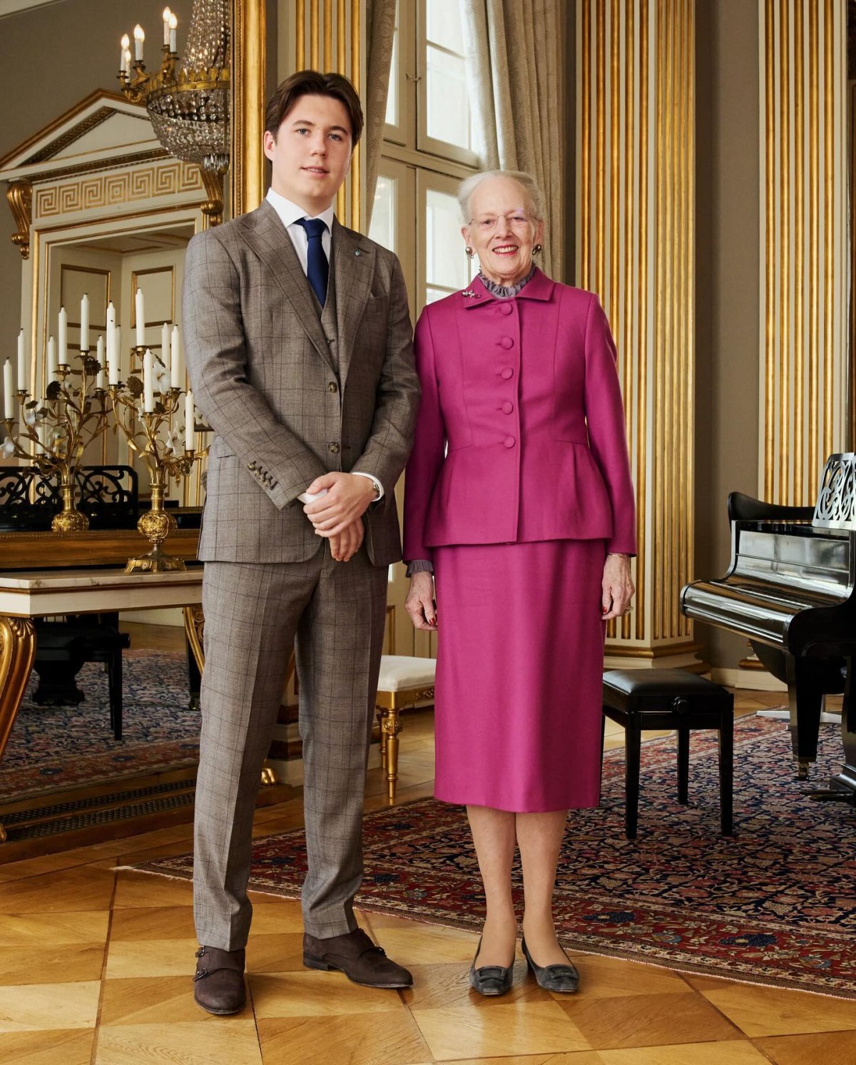 Prince Christian of Denmark poses with Queen Margrethe II during his 18th birthday celebrations at Amalienborg Palace in Copenhagen on October 15, 2023 (Dennis Stenild/Kongehuset)