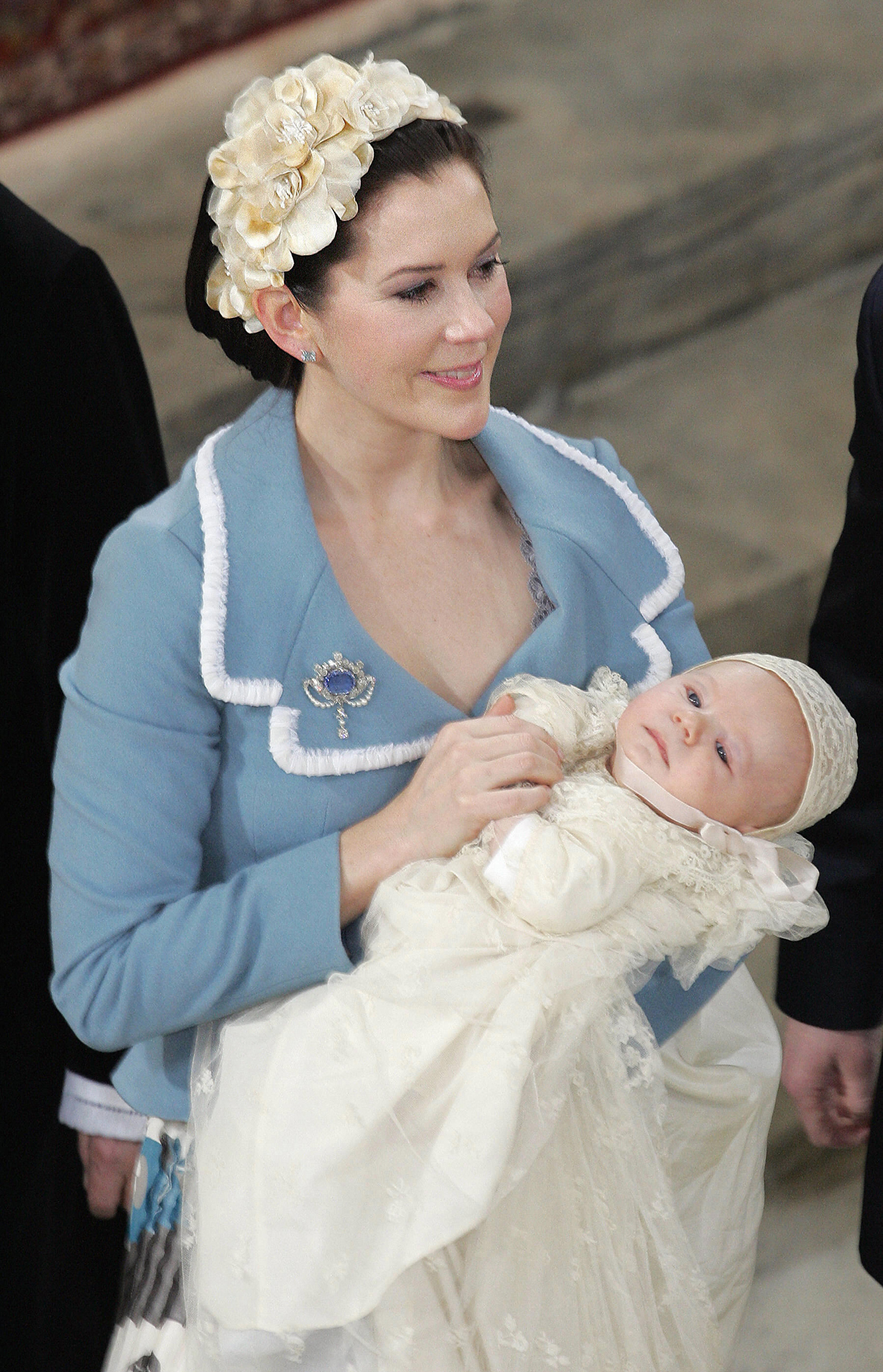 Crown Princess Mary of Denmark holds Prince Christian during his christening ceremony at the chapel of Christiansborg Palace in Copenhagen on January 21, 2006 (SVEN NACKSTRAND/AFP via Getty Images)