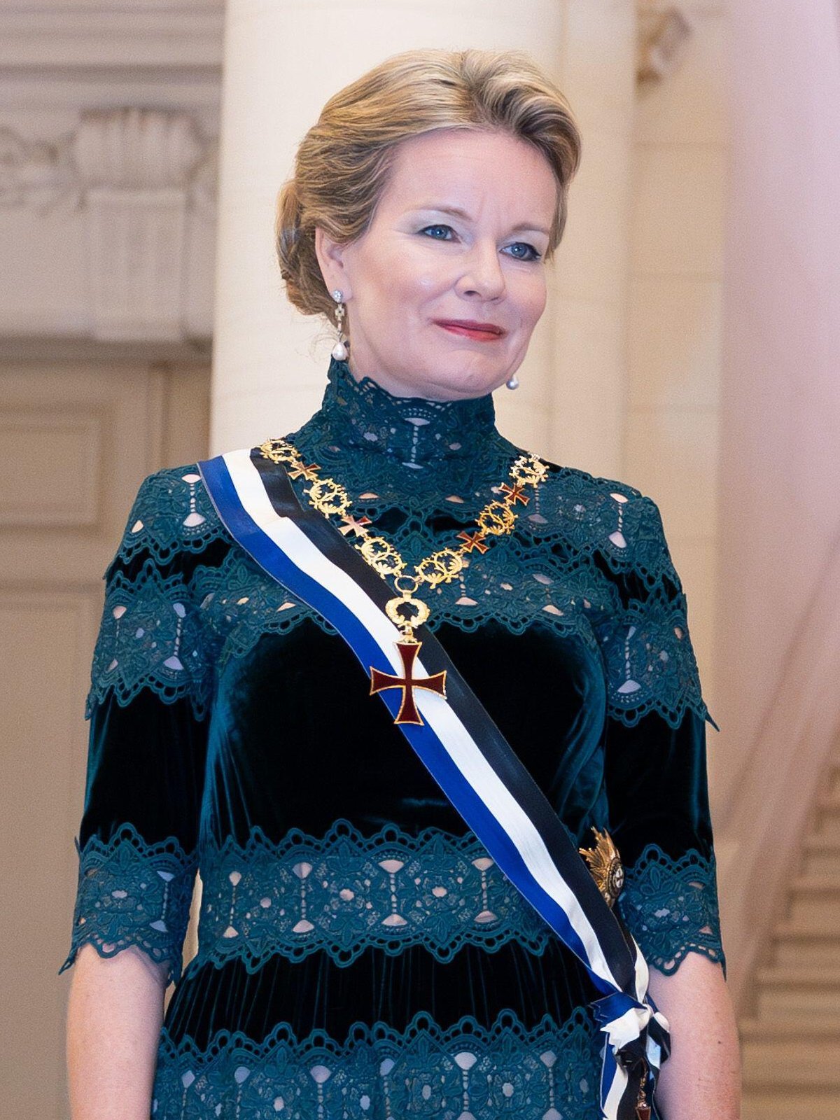 The Queen of the Belgians attends a state dinner at Laeken Castle in honor of the visiting President of Portugal, October 17, 2023 (Benoit Doppagne/Belga News Agency/Alamy)