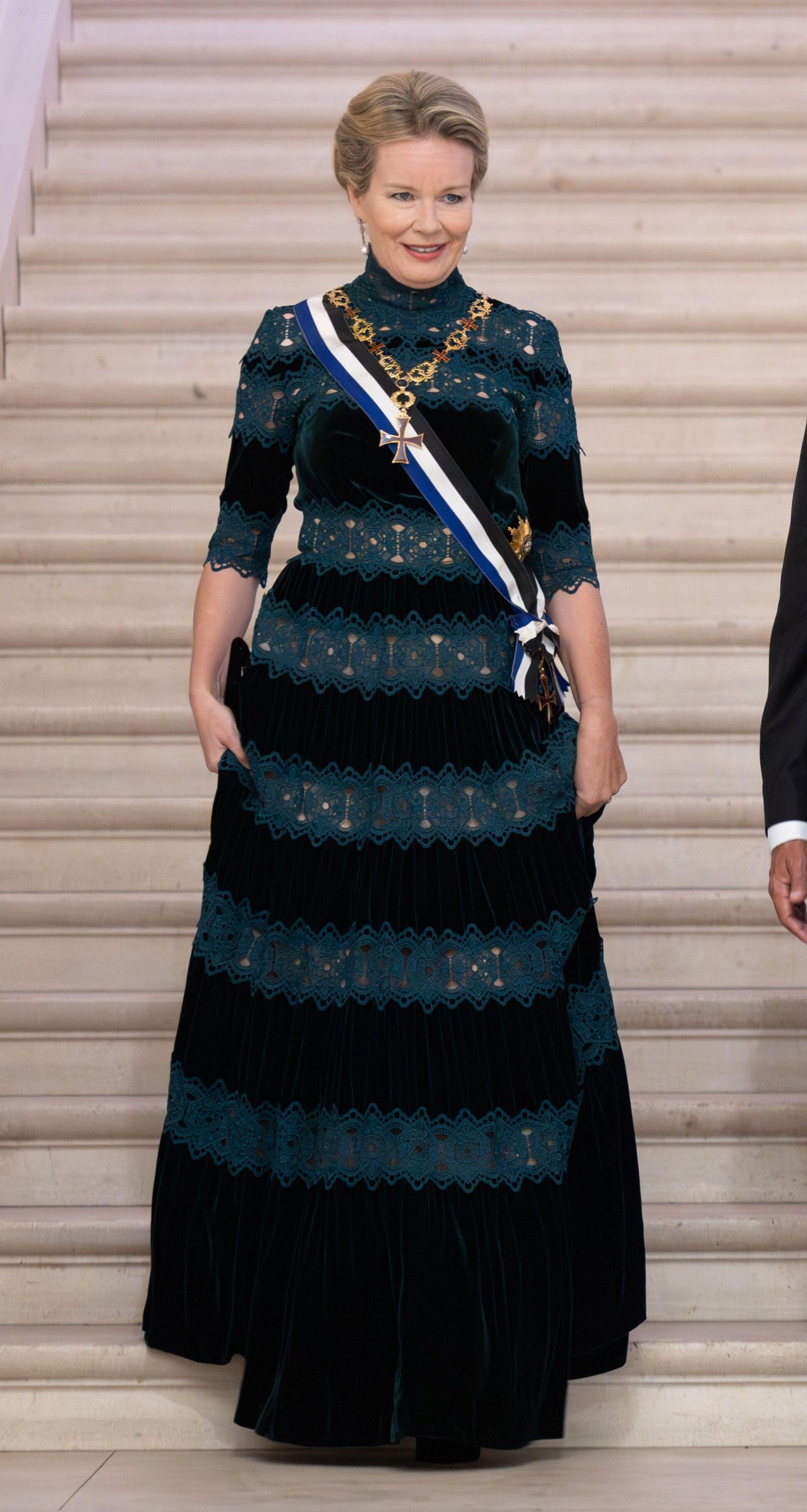 The Queen of the Belgians attends a state dinner at Laeken Castle in honor of the visiting President of Portugal, October 17, 2023 (Benoit Doppagne/Belga News Agency/Alamy)