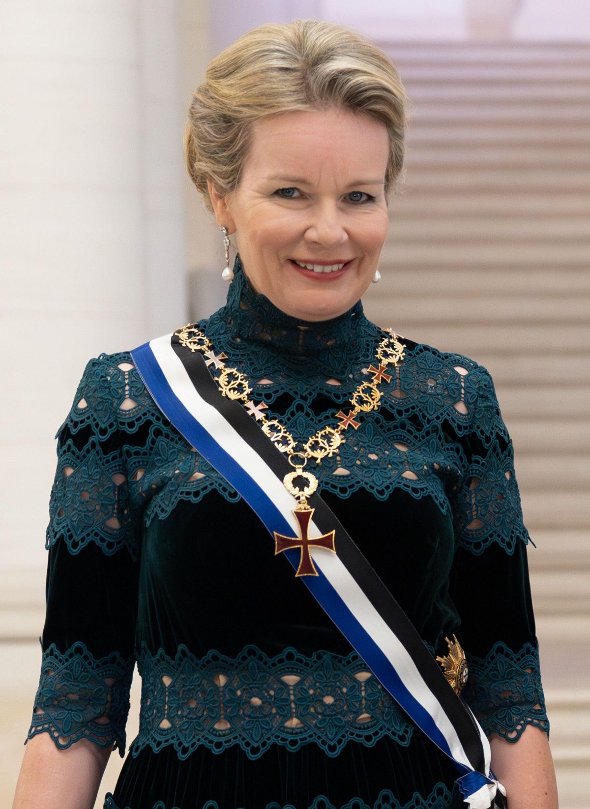 The Queen of the Belgians attends a state dinner at Laeken Castle in honor of the visiting President of Portugal, October 17, 2023 (Benoit Doppagne/Belga News Agency/Alamy)