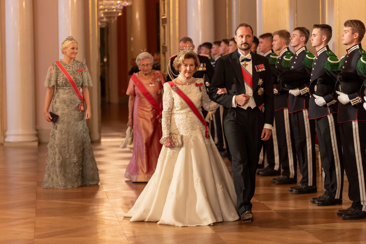 The Queen of Norway, the Crown Prince and Crown Princess of Norway, and Princess Astrid attend a gala dinner for representatives of the Storting at the Royal Palace in Oslo on October 26, 2023 (Frederik Ringnes/NTB/Alamy)