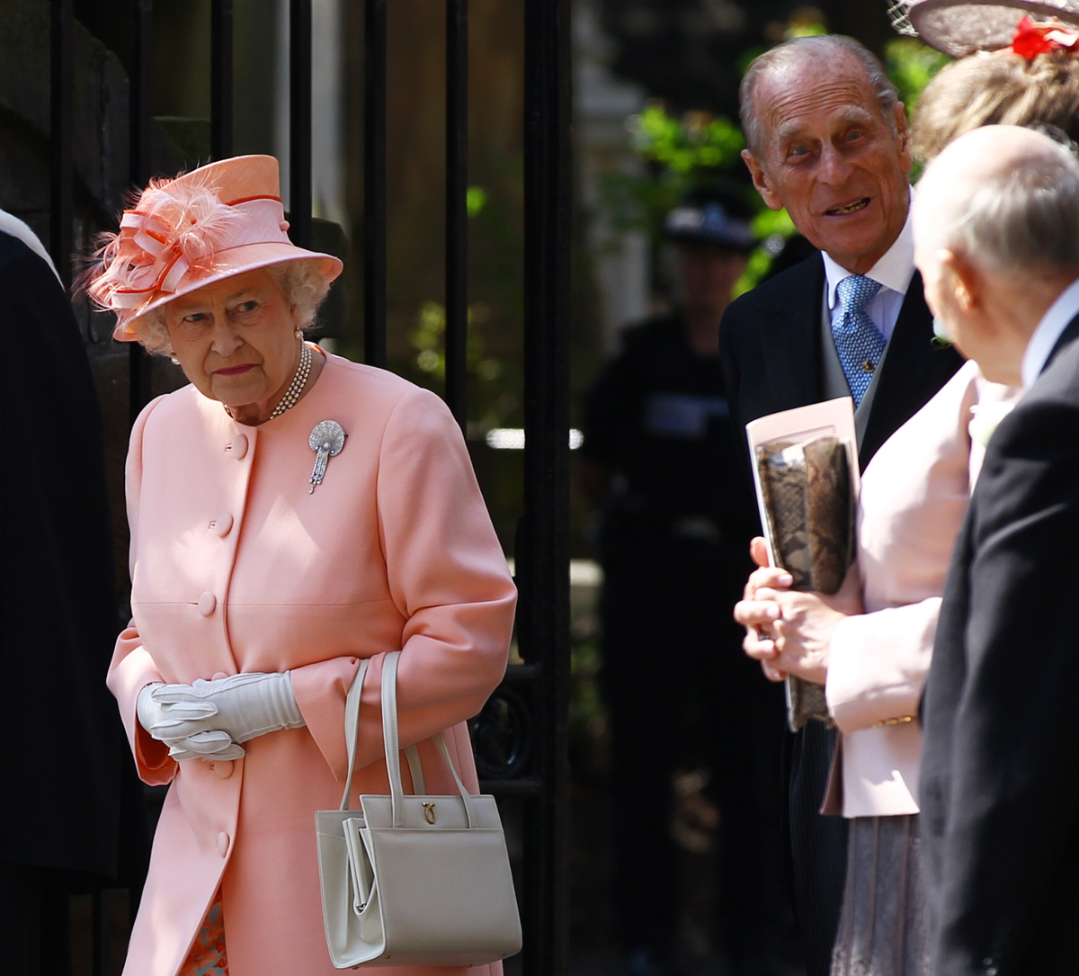 Queen Elizabeth II and the Duke of Edinburgh depart after the wedding of Zara Phillips and Mike Tindall at Canongate Kirk in Edinburgh on July 30, 2011 (Jeff J. Mitchell/Getty Images)