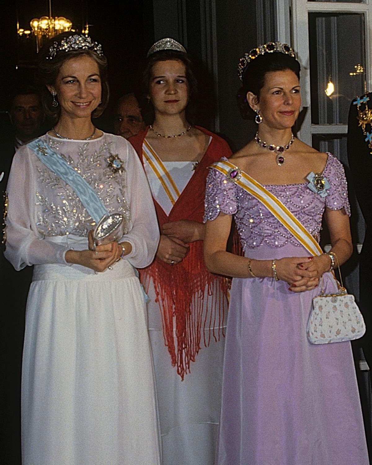 Queen Sofia of Spain, Infanta Elena of Spain, and Queen Silvia of Sweden attend the return dinner at the Swedish embassy in Madrid during the Swedish state visit to Spain, 1983 (Classic Picture Library/Alamy)