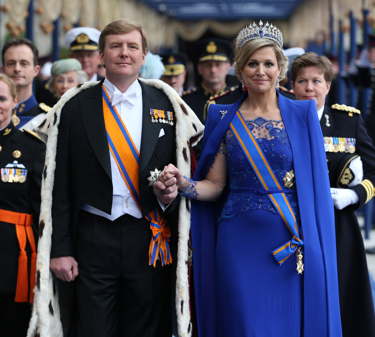 King Willem-Alexander and Queen Maxima of the Netherlands depart after his inauguration ceremony in Amsterdam on April 30, 2013 (Jasper Juinen - Pool/Getty Images)
