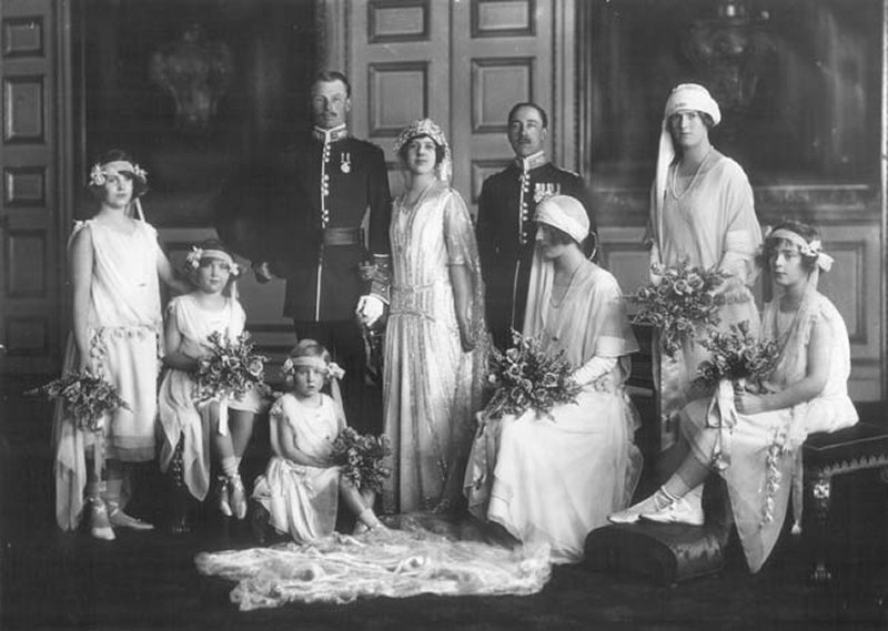 Princess Maud and Lord Carnegie, with their bridal party, pose for an official wedding portrait at St. James's Palace in London on November 12, 1923 (Lafayette/V&A Museum)
