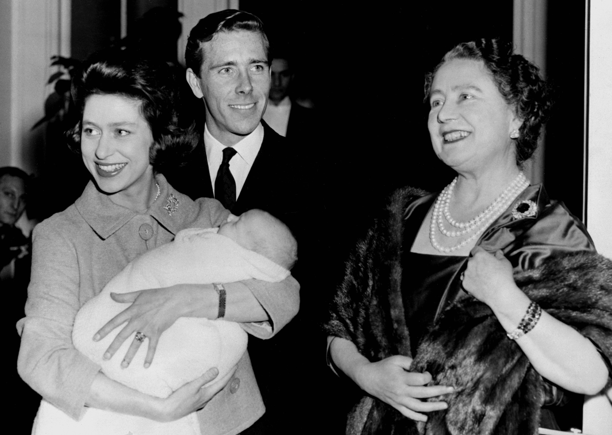 The Queen Mother poses with Princess Margaret, Lord Snowdon, and their newborn son, Lord Linley, at Clarence House on December 1, 1961 (AFP/Getty Images)