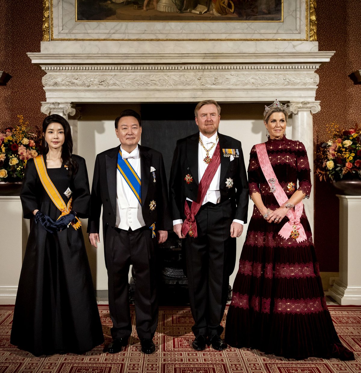 King Willem-Alexander and Queen Maxima of the Netherlands, with President Yoon Suk Yeo and First Lady Kim Keon-hee of South Korea, attend a state banquet at the Royal Palace in Amsterdam on December 12, 2023 (KOEN VAN WEEL/ANP/Alamy)