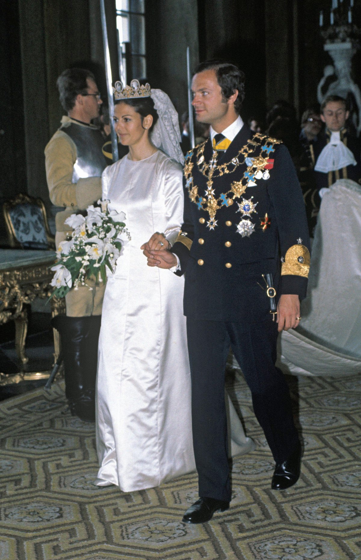 King Carl XVI Gustaf and Queen Silvia of Sweden are pictured after their royal wedding in Stockholm on June 19, 1976 (Classic Picture Library/Alamy)