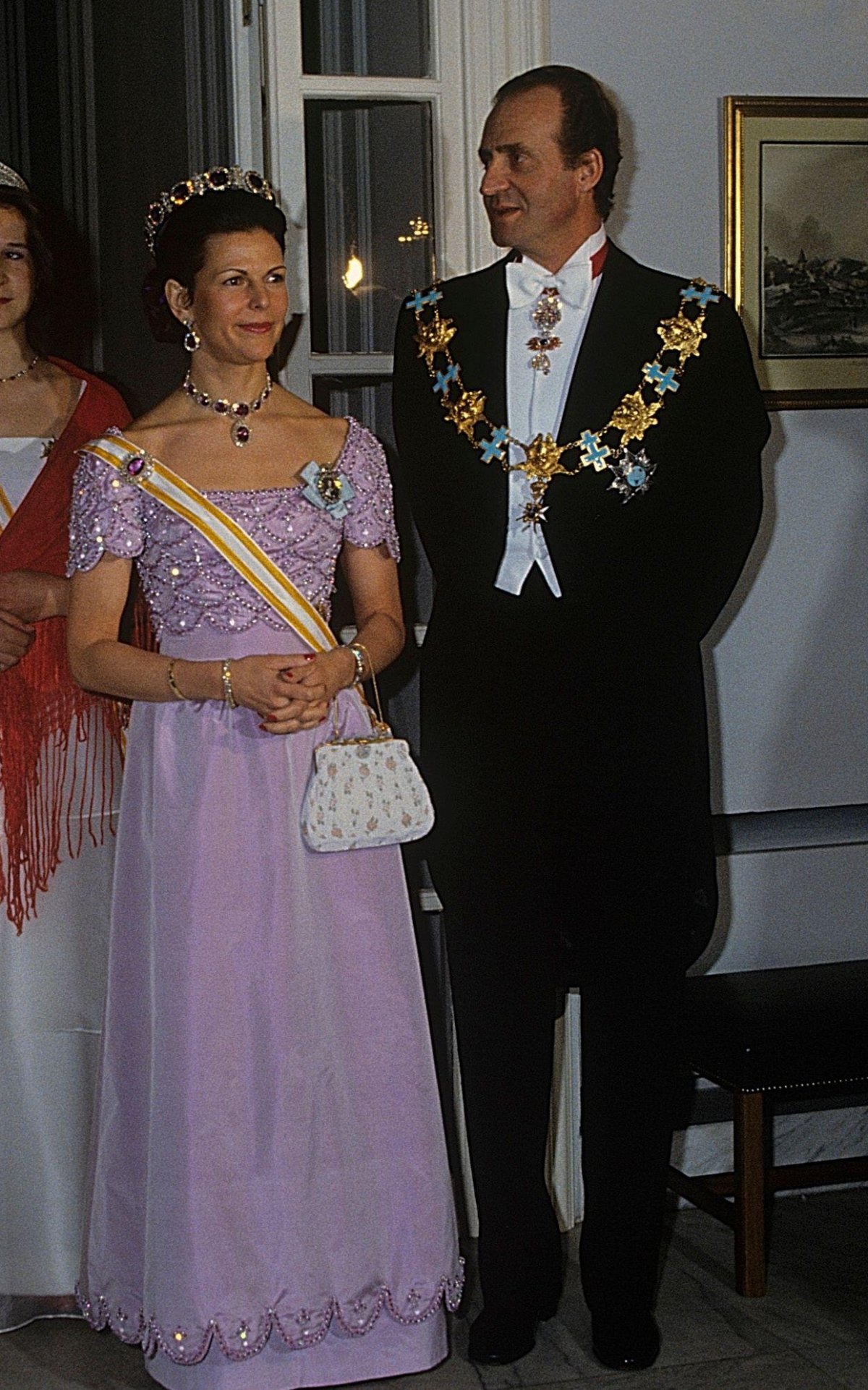 King Carl XVI Gustaf and Queen Silvia of Sweden host a return dinner for King Juan Carlos, Queen Sofia, and Infanta Elena of Spain at the Swedish Embassy in Madrid on March 23, 1983 (Classic Picture Library/Alamy)