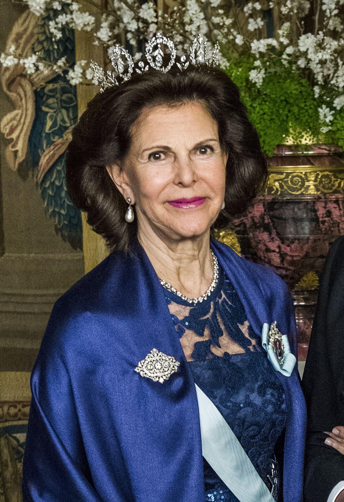 Queen Silvia of Sweden attends an official dinner at the Royal Palace in Stockholm on March 23, 2017 (Claudio Bresciani/TT News Agency/Alamy)