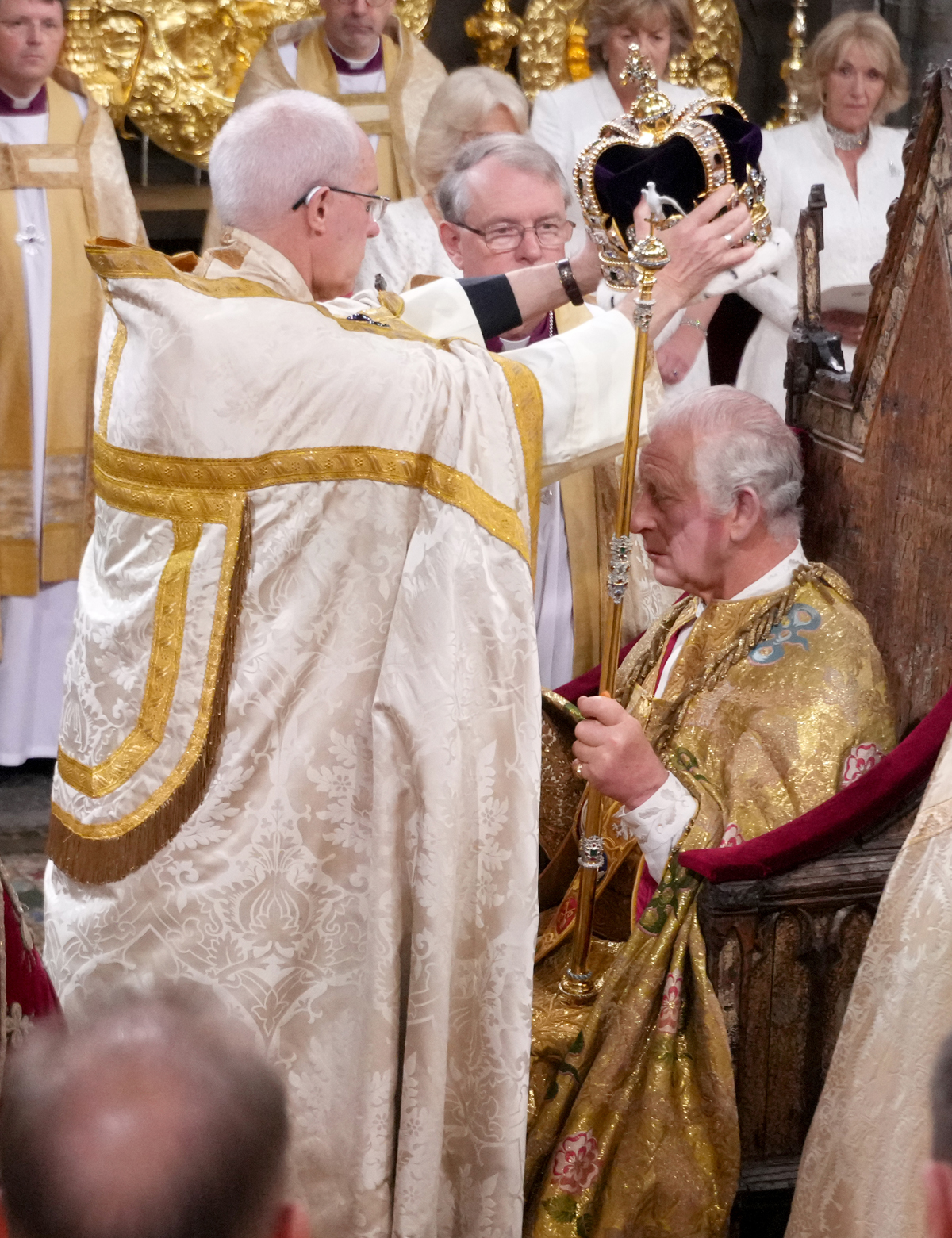 The Archbishop of Canterbury, Rev. Justin Welby, crowns King Charles III of the United Kingdom in Westminster Abbey on May 6, 2023 (Victoria Jones - WPA Pool/Getty Images)