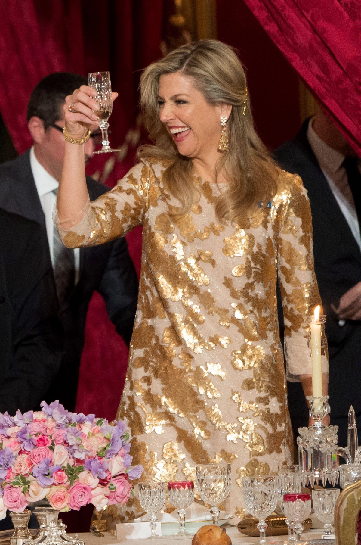 Queen Maxima of the Netherlands toasts during the French state dinner in Paris on March 10, 2016 (Niviere-Villard/Pool/Abaca Press/Alamy)