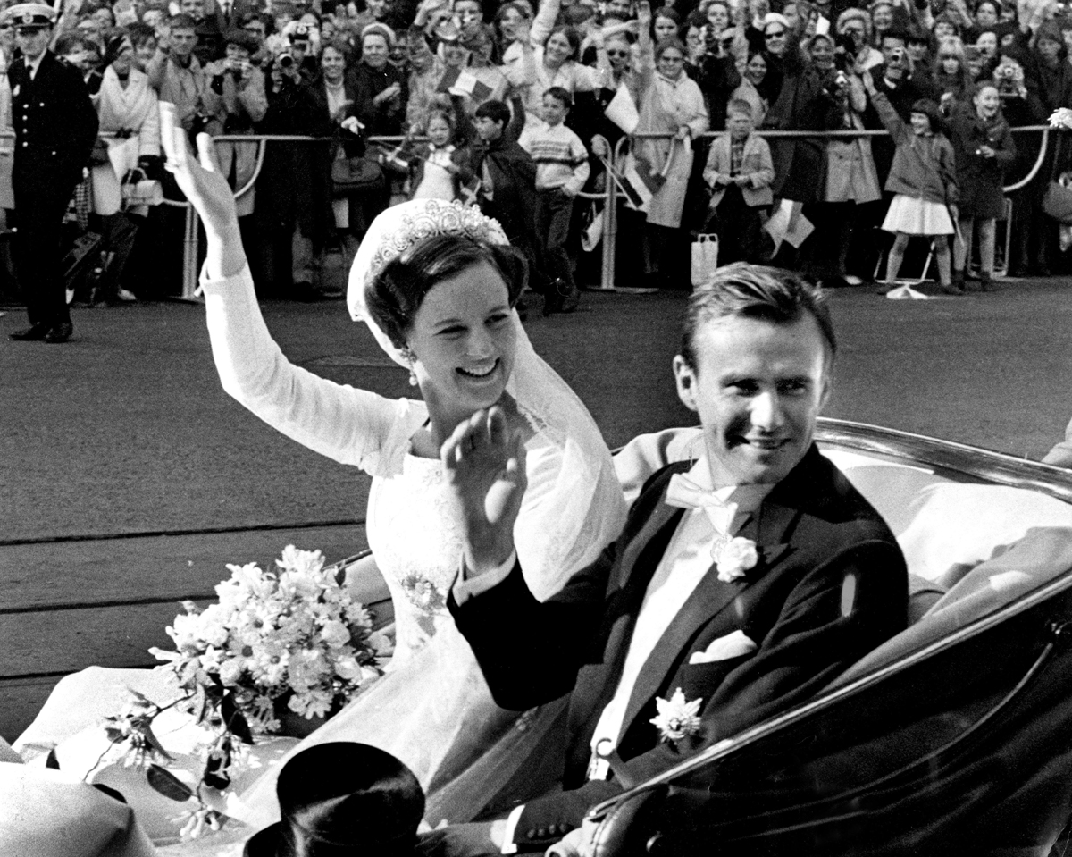 Crown Princess Margrethe and Prince Henrik of Denmark wave from a carriage on their wedding day in Copenhagen, June 10, 1967 (Jan Bjorsell/TT News Agency/Alamy)