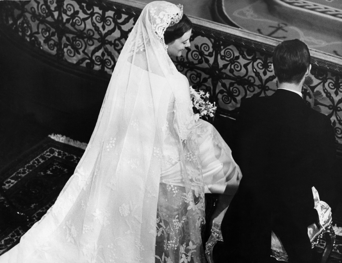 Crown Princess Margrethe and Prince Henrik of Denmark are pictured during their wedding ceremony in Copenhagen, June 10, 1967 (Interfoto/Alamy)