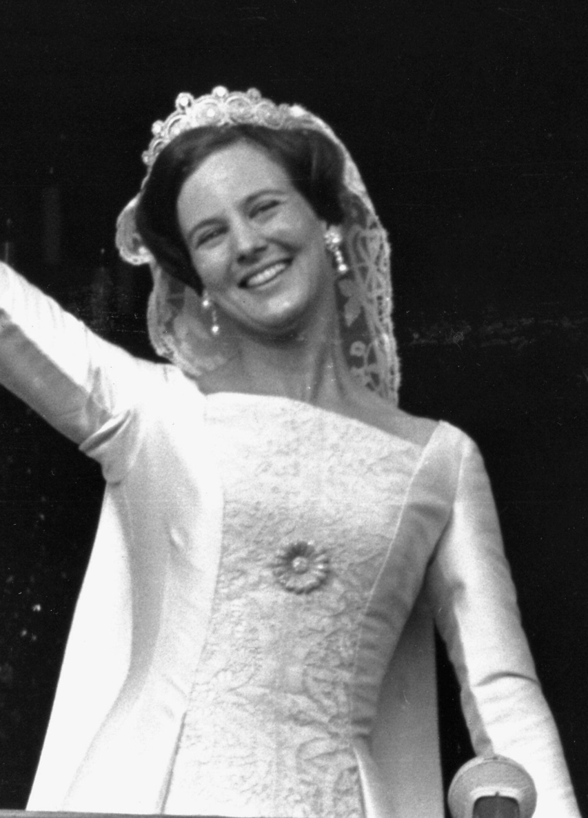 Crown Princess Margrethe of Denmark waves from the palace balcony on her wedding day in Copenhagen, June 10, 1967 (Ritzau/Alamy)