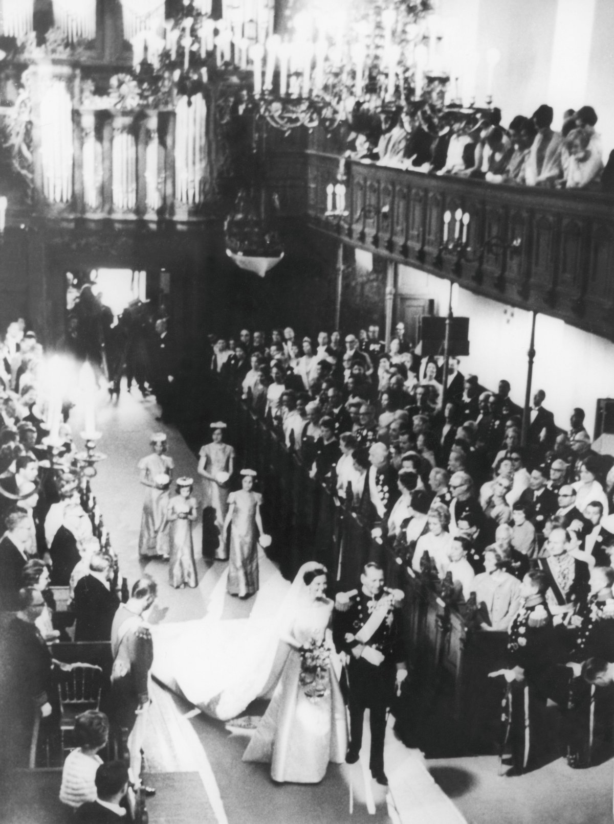 King Frederik IX of Denmark escorts his daughter, Crown Princess Margrethe, down the aisle on her wedding day in Copenhagen, June 10, 1967 (Interfoto/Alamy)