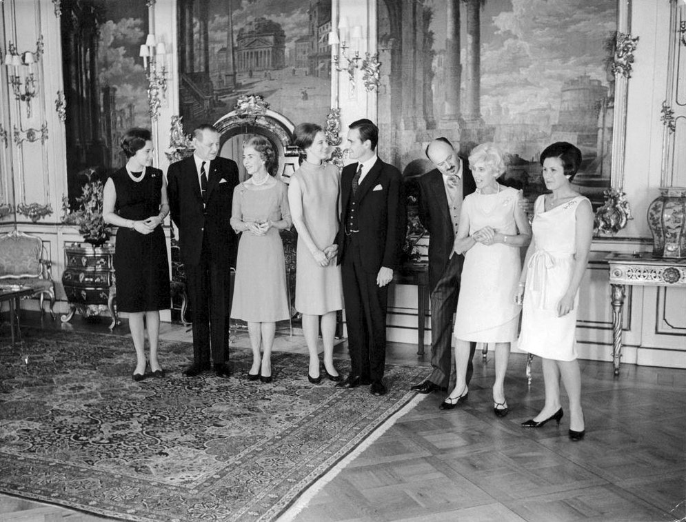 Crown Princess Margrethe of Denmark and Henri de Laborde de Monpezat pose with their families during the official announcement of their royal engagement, October 1966 (IMS Vintage Photos/Wikimedia Commons)