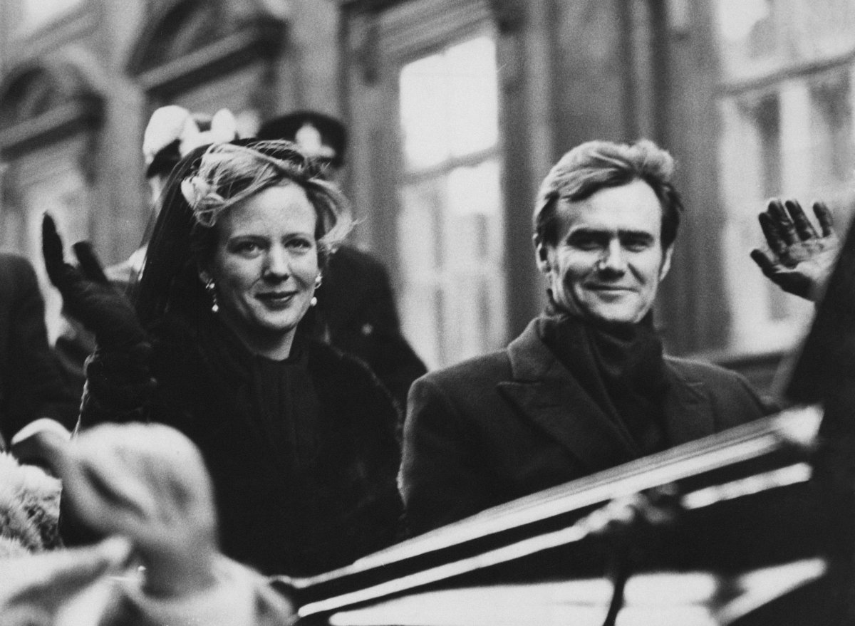 Queen Margrethe II and Prince Henrik of Denmark ride in an open carriage from Christiansborg Palace to Amalienborg in Copenhagen on January 15, 1972 (Ritzau/Alamy)