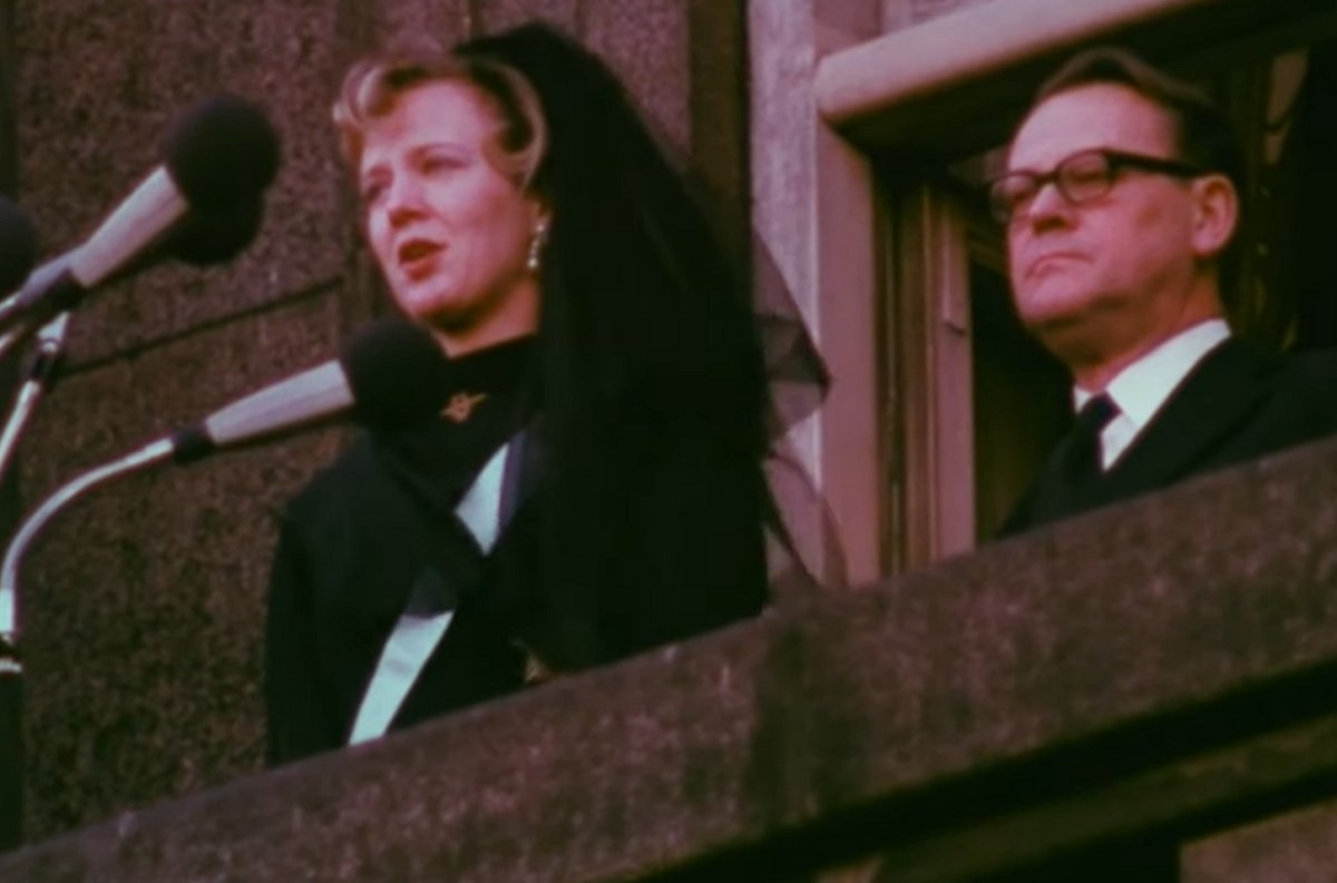 Queen Margrethe II of Denmark speaks on the balcony of Christiansborg Palace in Copenhagen after Prime Minister Jens Otto Krag proclaims her accession, January 15, 1972 (screencapture)