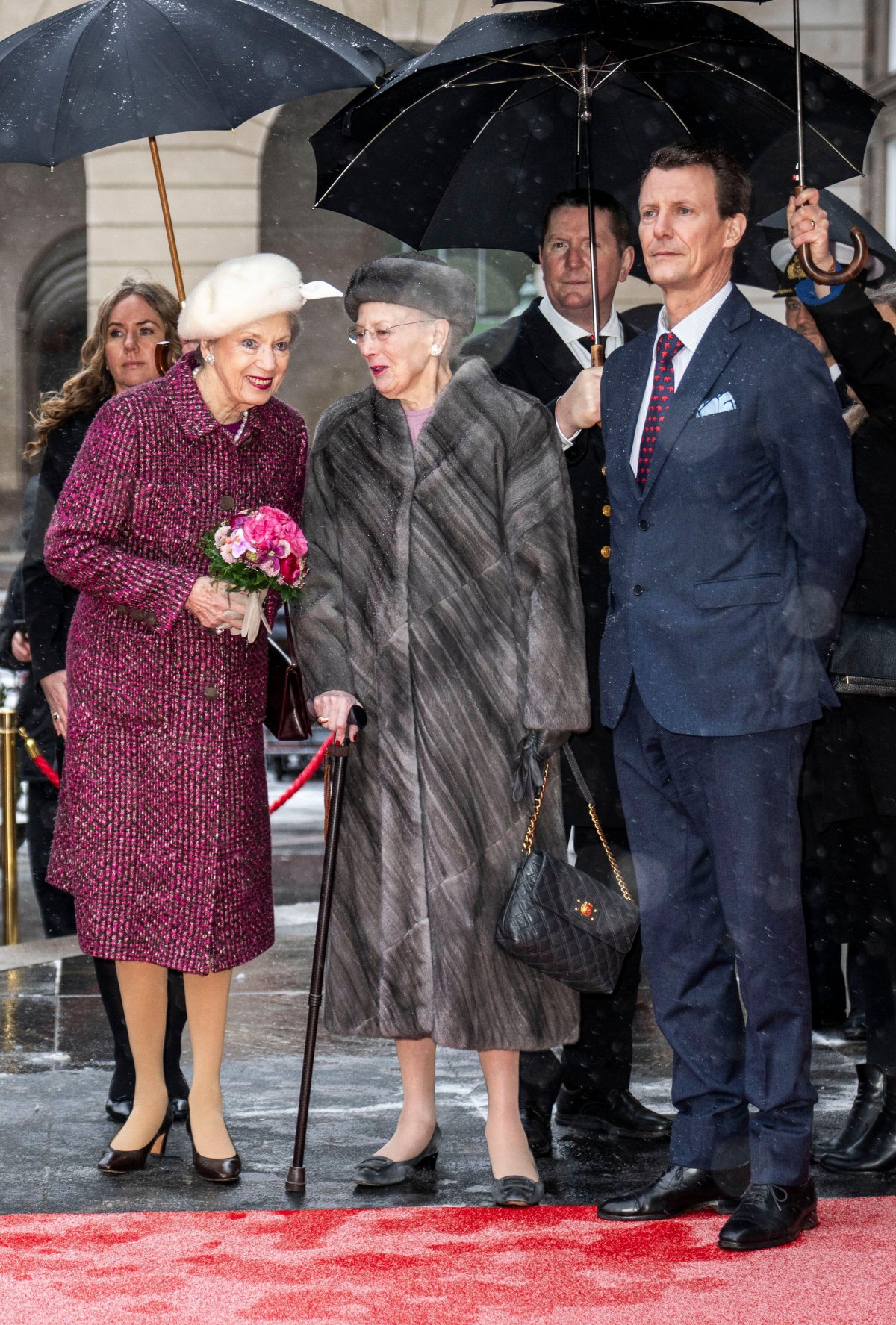 Princess Benedikte, Queen Margrethe, and Prince Joachim of Denmark arrive for a reception at the Folketing, Denmark's parliament, at Christiansborg Palace in Copenhagen on January 15, 2024 (Thomas Traasdahl/Ritzau Scanpix/Alamy)